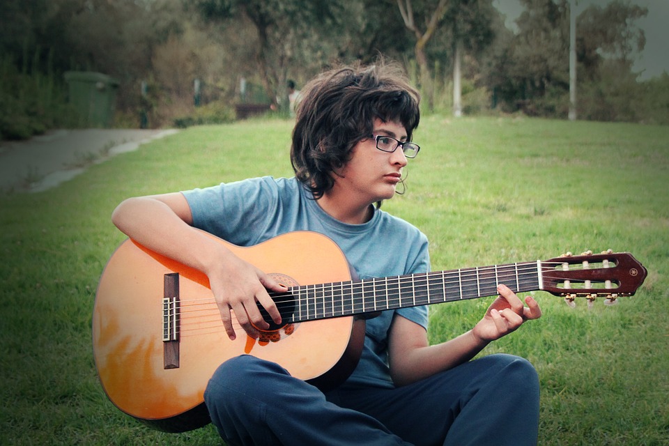 Boy playing guitar